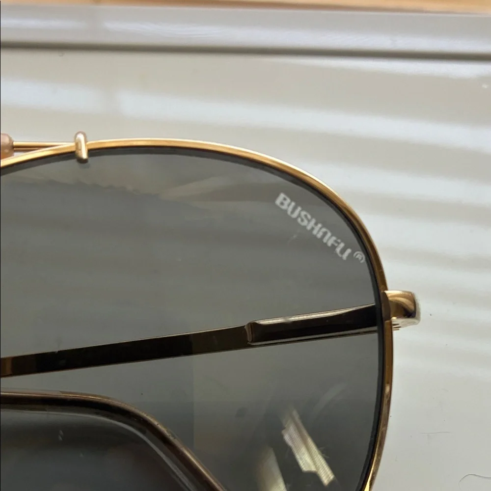Vintage Bushnell Men’s Aviator Gold Frame Sunglasses with Black Lenses